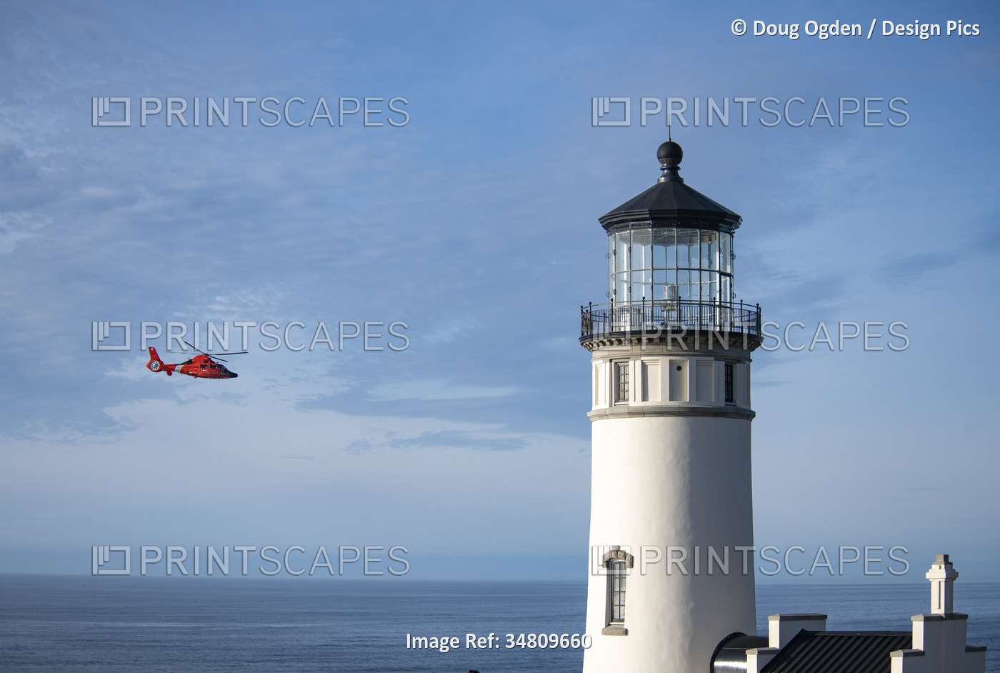 U. S. Coast Guard crew and Eurocopter MH-65 Performing rescue training ...